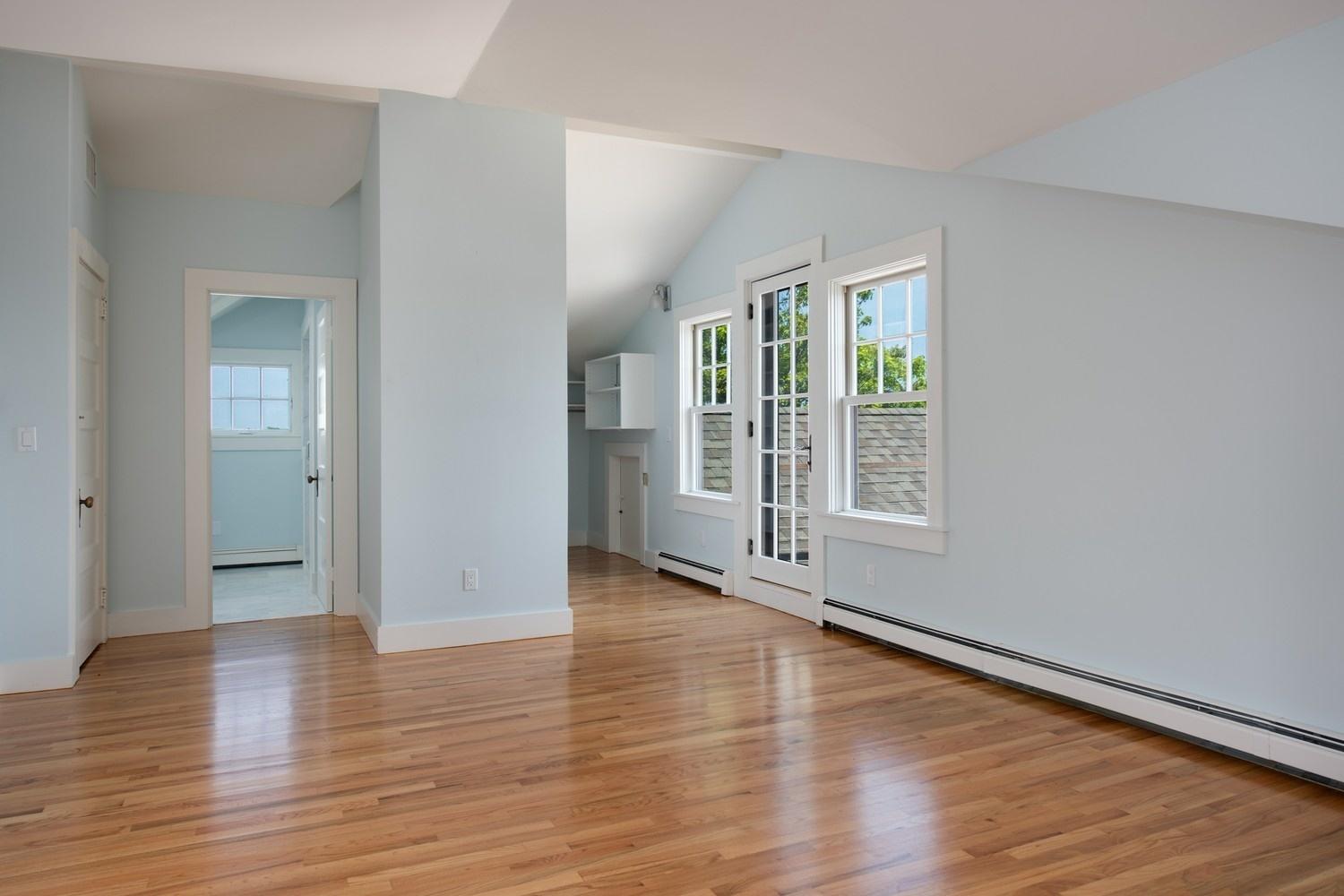773 South Main Street Centerville, MA 02632 - Photo 16 of 33 wooden floor in an empty room with a window