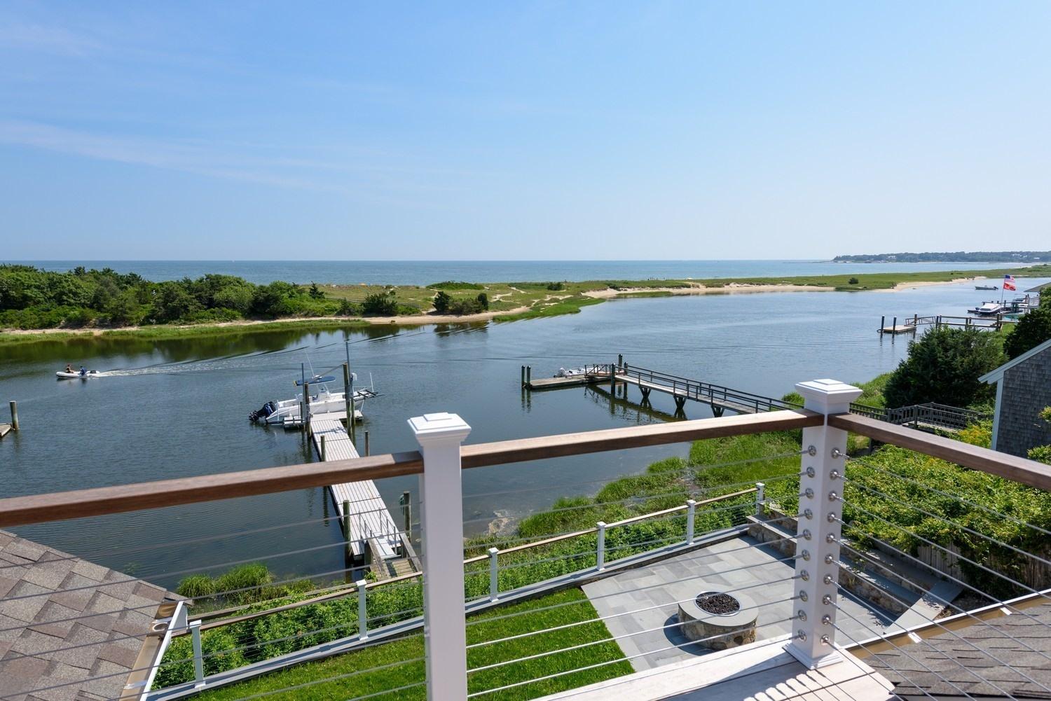 773 South Main Street Centerville, MA 02632 - Photo 28 of 33 a view of a balcony with lake view and wooden floor