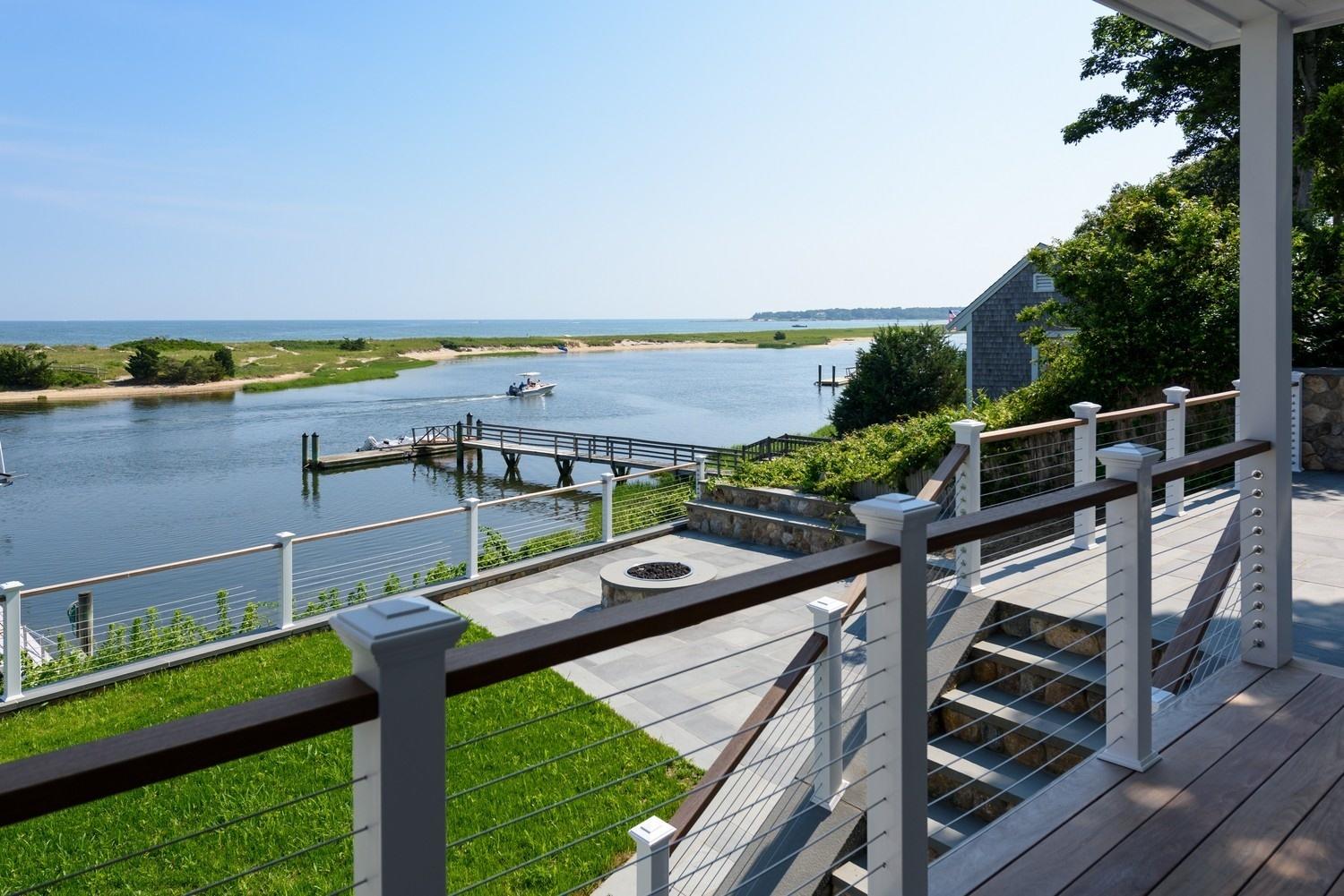 773 South Main Street Centerville, MA 02632 - Photo 6 of 33 a view of a balcony with chairs and wooden floor