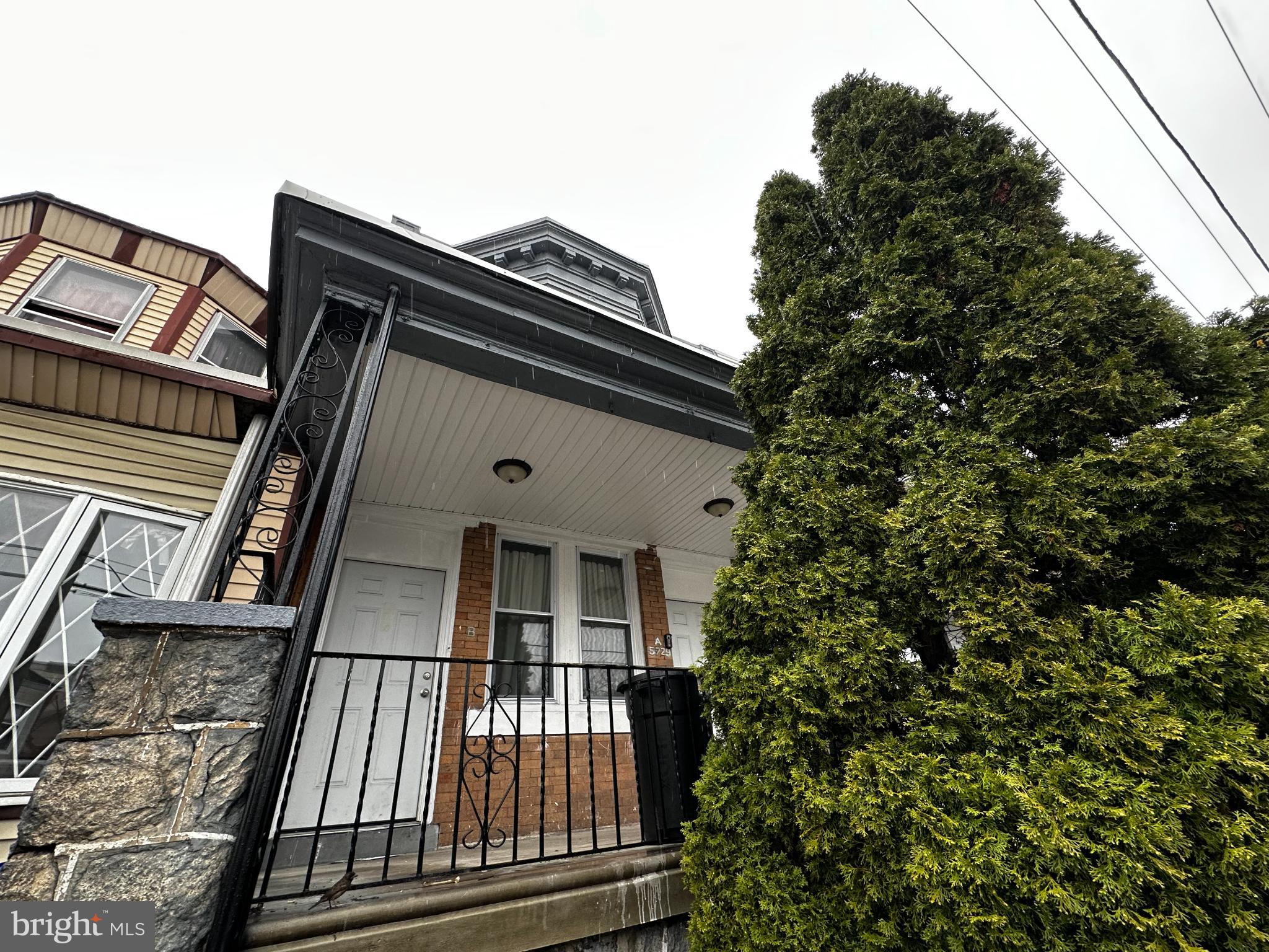 5729 Pine Street, Unit 2 Philadelphia, PA 19143 - Photo 21 of 21 a front view of a house