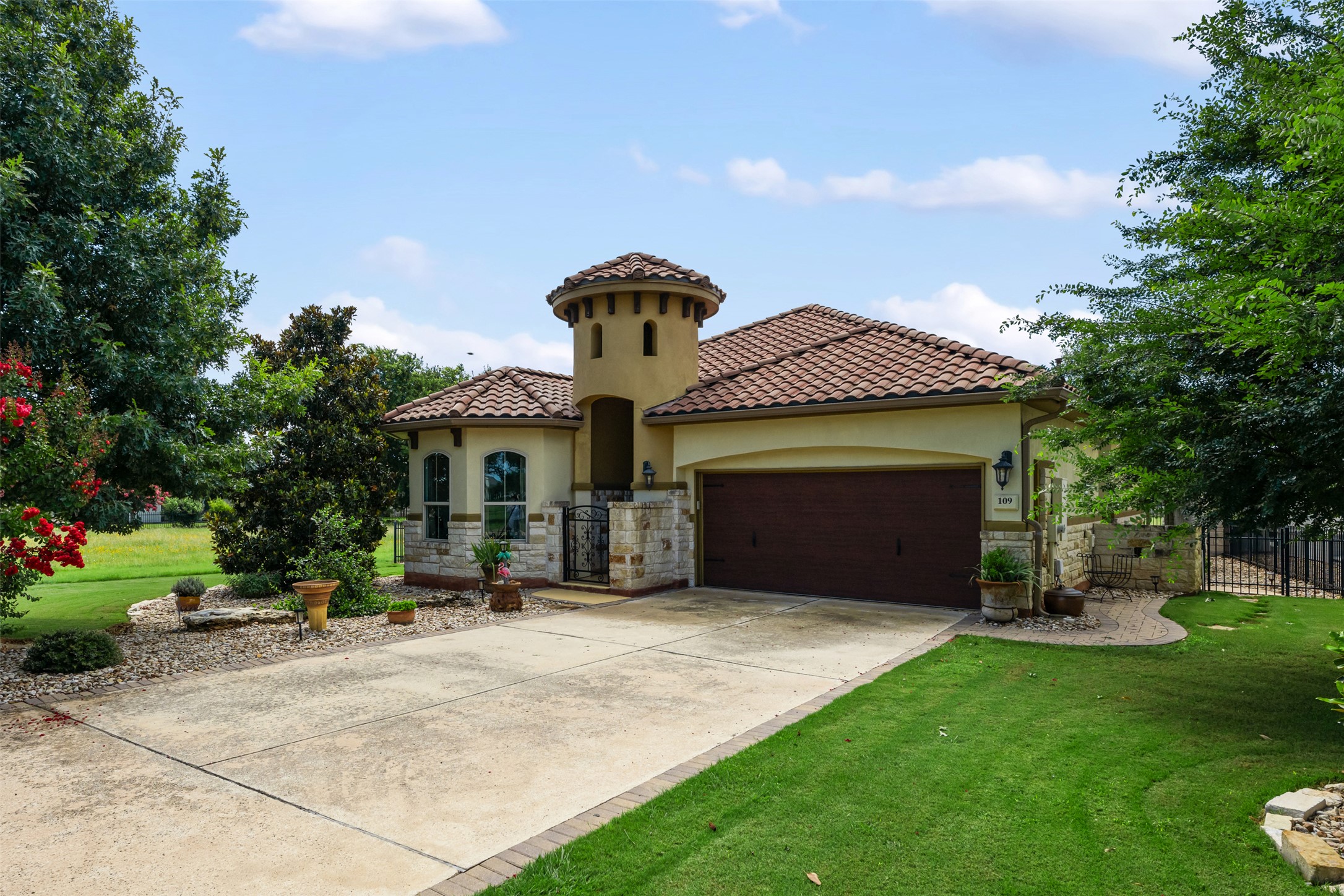 109 Limestone Drive Georgetown, TX 78628 - Photo 15 of 40 a front view of a house with a yard and garage