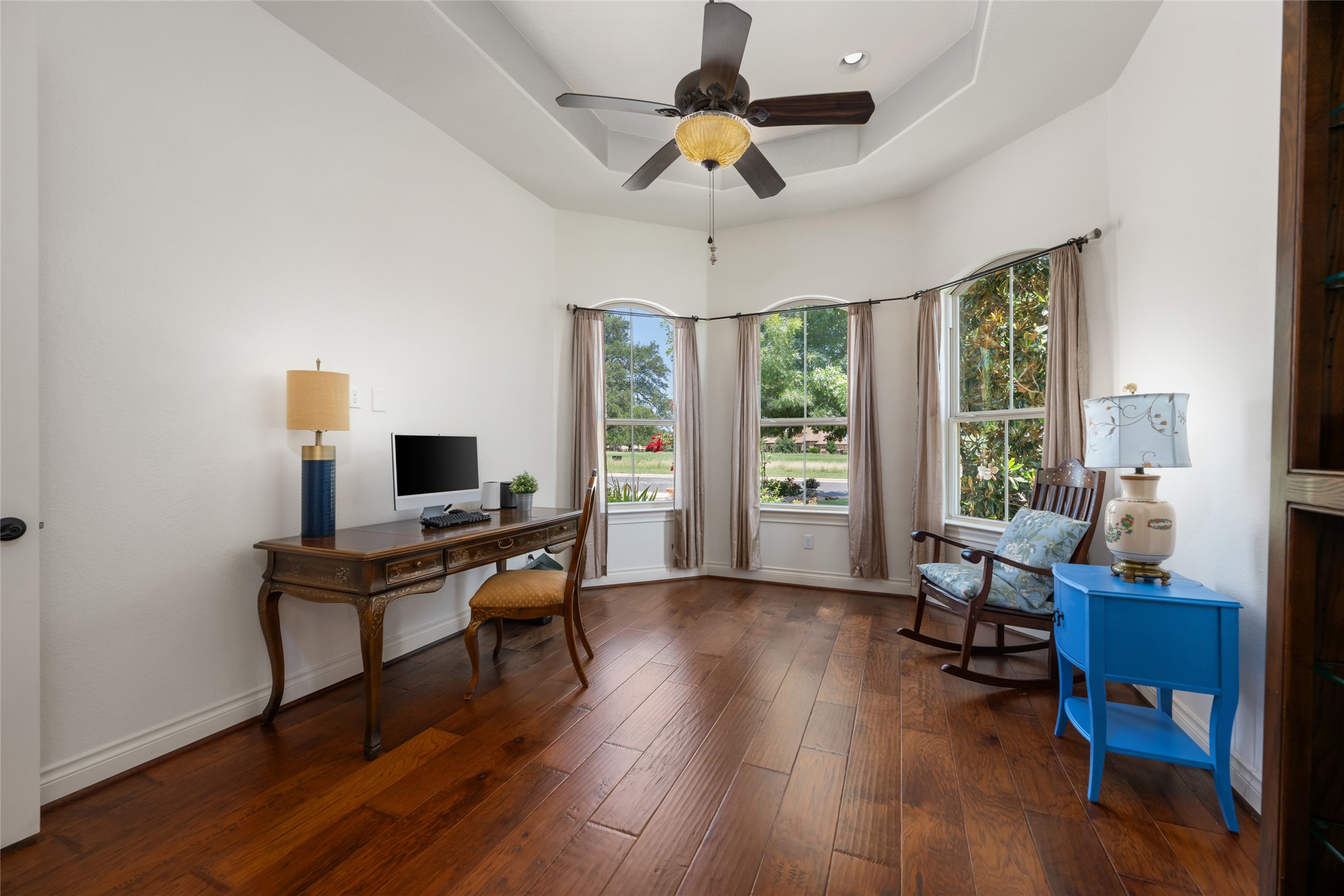 109 Limestone Drive Georgetown, TX 78628 - Photo 21 of 40 a view of a workspace with furniture and a window