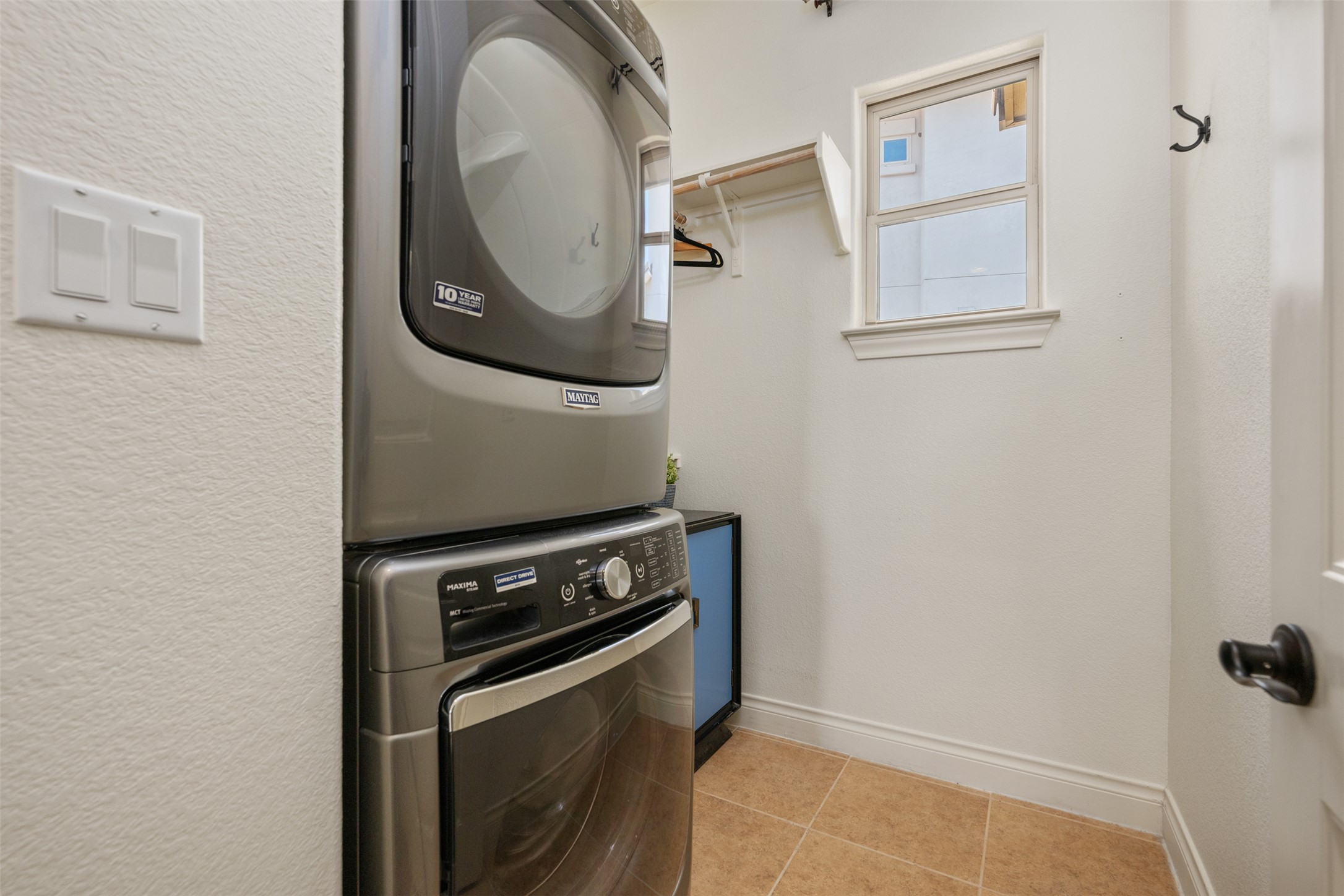 109 Limestone Drive Georgetown, TX 78628 - Photo 25 of 40 a view of a storage and utility room with washer and dryer