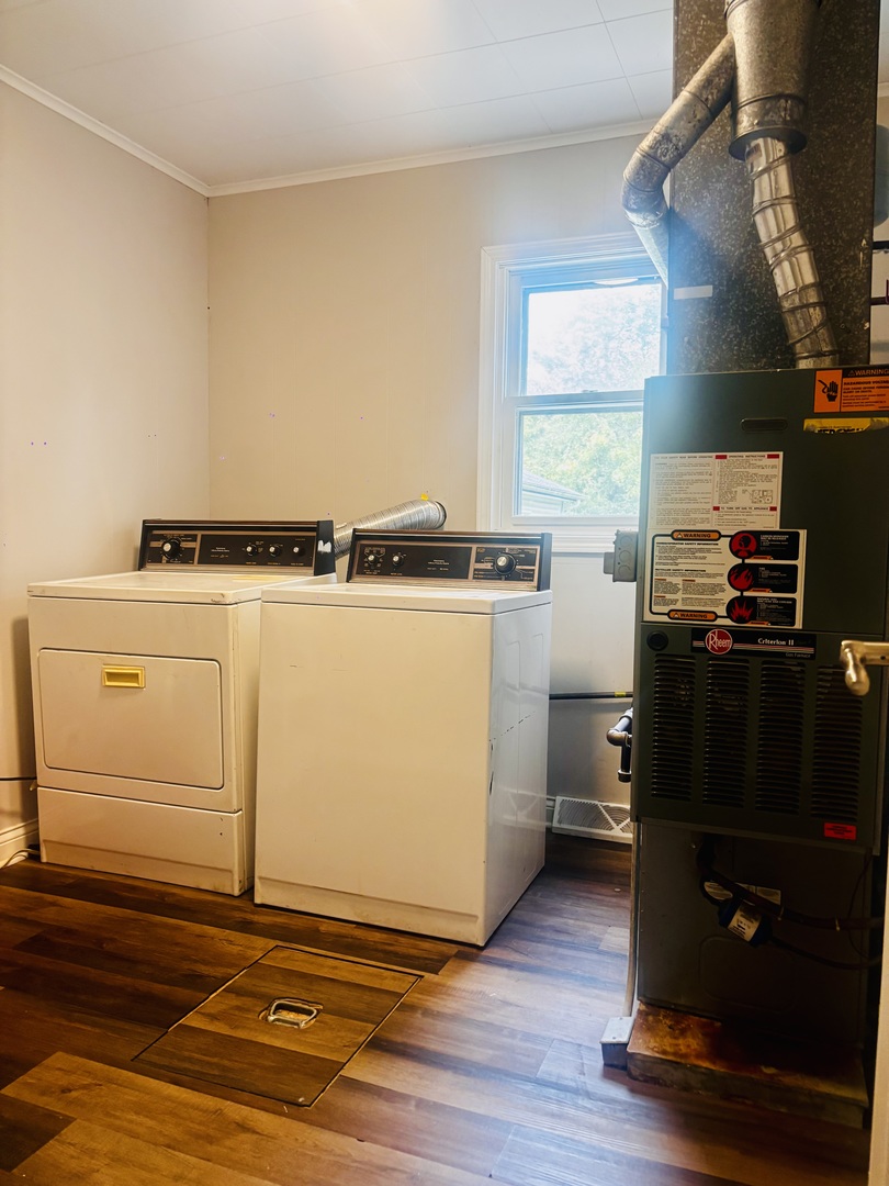 1514 173rd Street East Hazel Crest, IL 60429 - Photo 17 of 20 a room with wooden floor and white walls