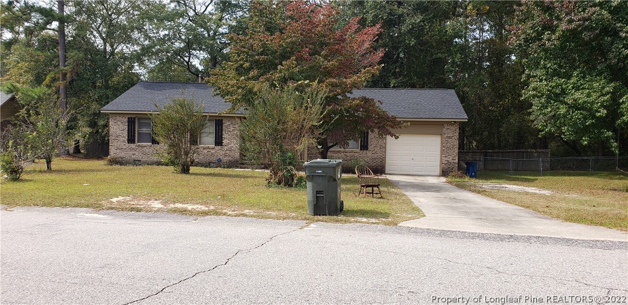 6716 Vaughn Road Fayetteville, NC 28304 - Photo 1 of 5 a view of a house with basketball court