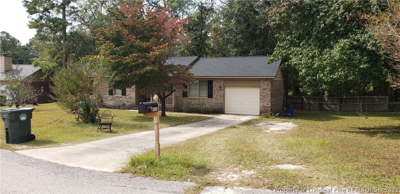 6716 Vaughn Road Fayetteville, NC 28304 - Photo 3 of 5 a house view with a outdoor space