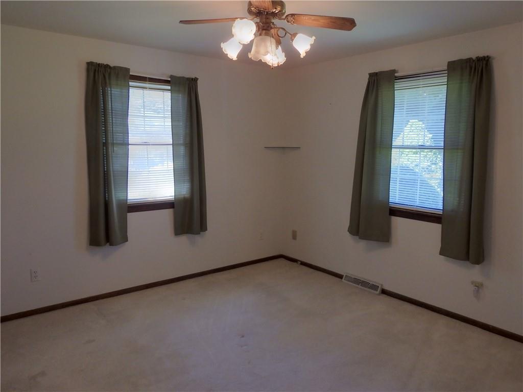 7111 Country Club Road Butler, PA 16001 - Photo 16 of 25 an empty room with windows