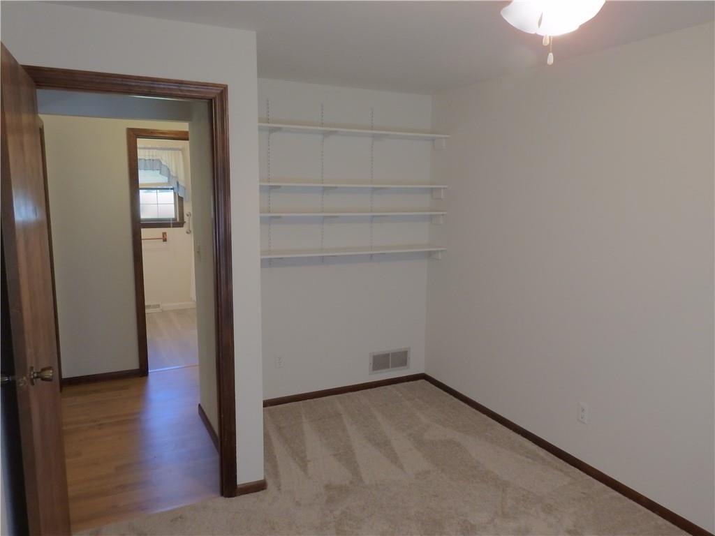 7111 Country Club Road Butler, PA 16001 - Photo 18 of 25 wooden floor in an empty room
