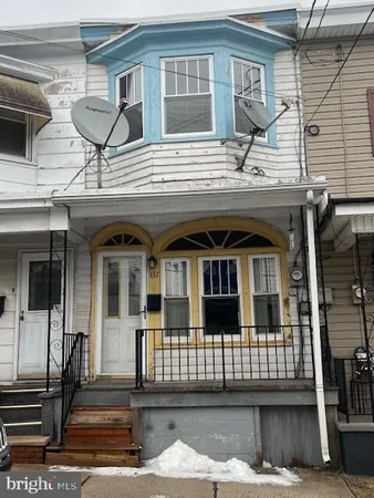 a front view of a house with a door