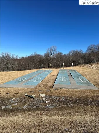 a view of a lake with sunset