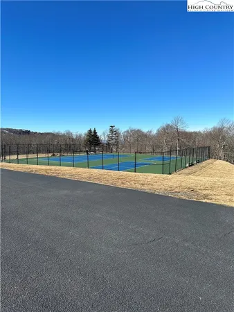 a view of ocean with a big yard