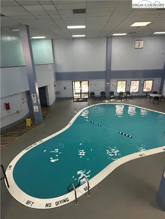 a view of a swimming pool and window