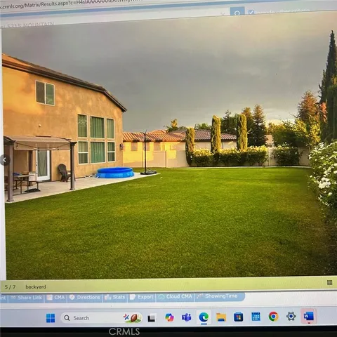 a view of outdoor space with swimming pool