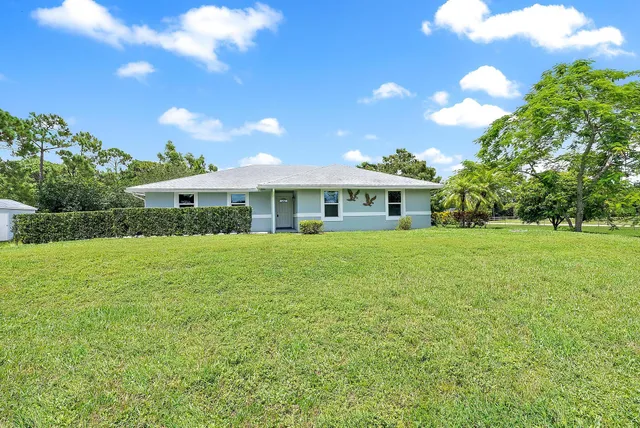 a front view of house with yard