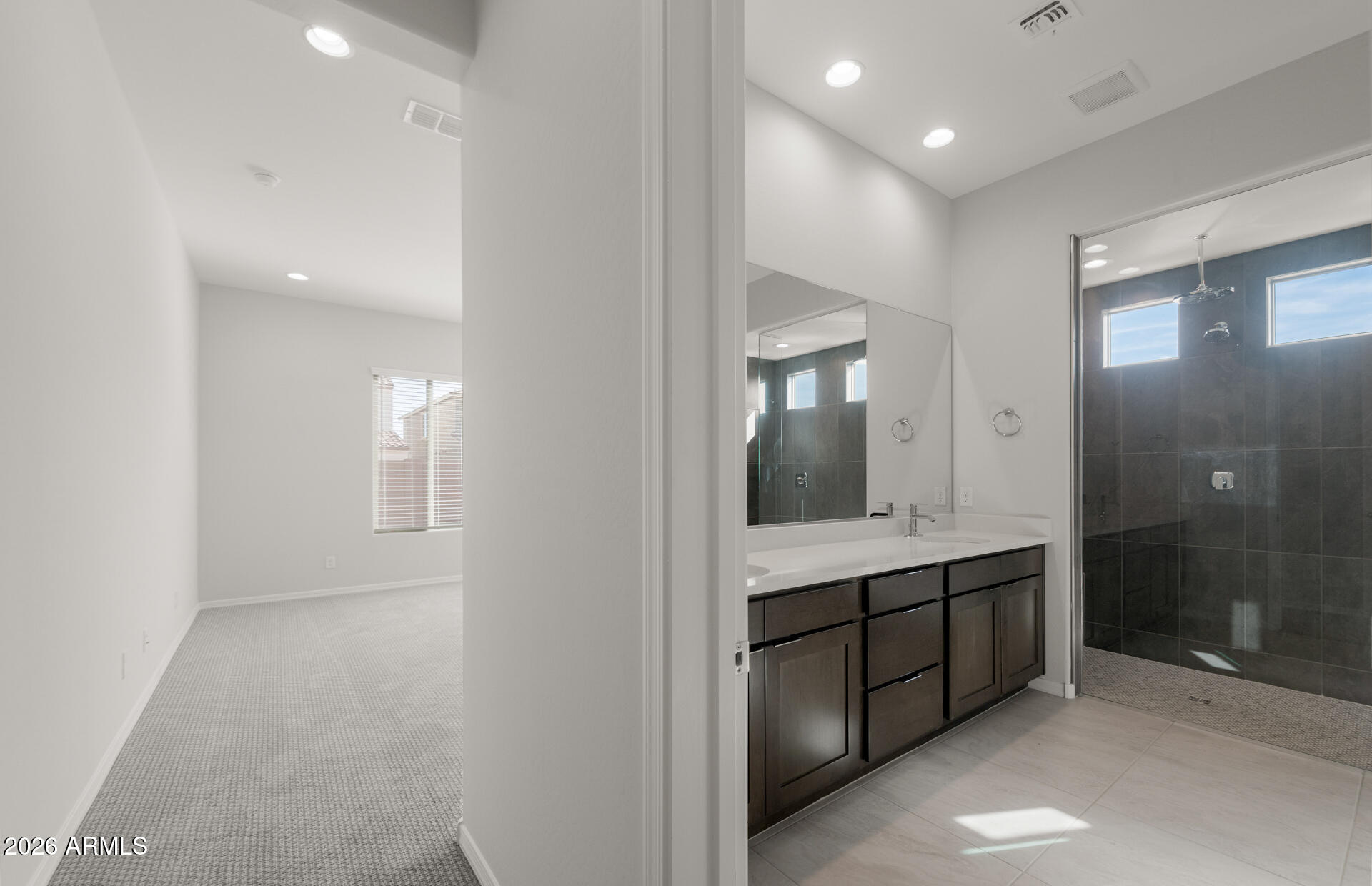 16081 West Bajada Road Surprise, AZ 85387 - Photo 18 of 28 a view of a bathroom from the hallway