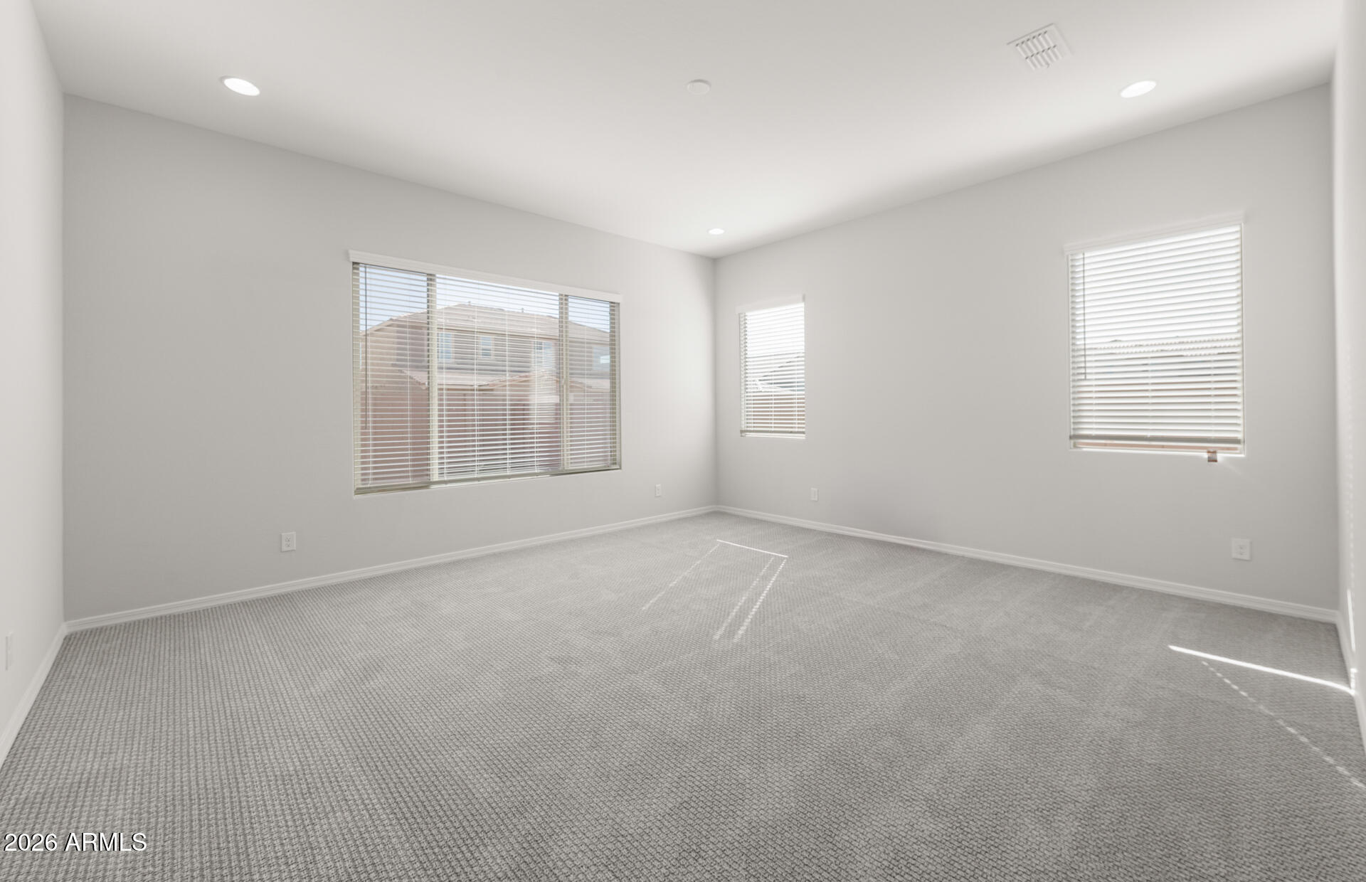 16081 West Bajada Road Surprise, AZ 85387 - Photo 19 of 28 an empty room with windows