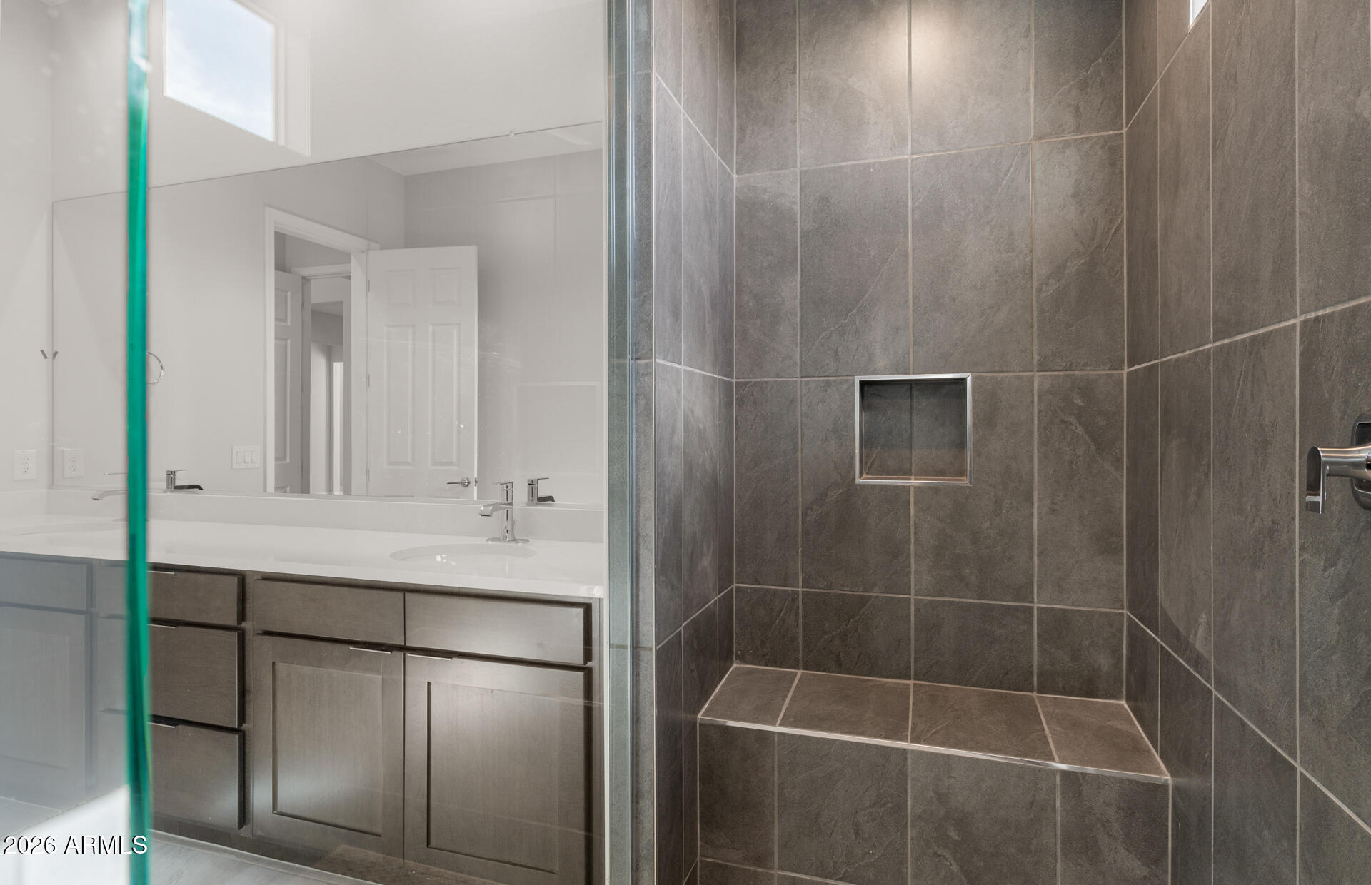 16081 West Bajada Road Surprise, AZ 85387 - Photo 22 of 28 a bathroom with a shower and a sink