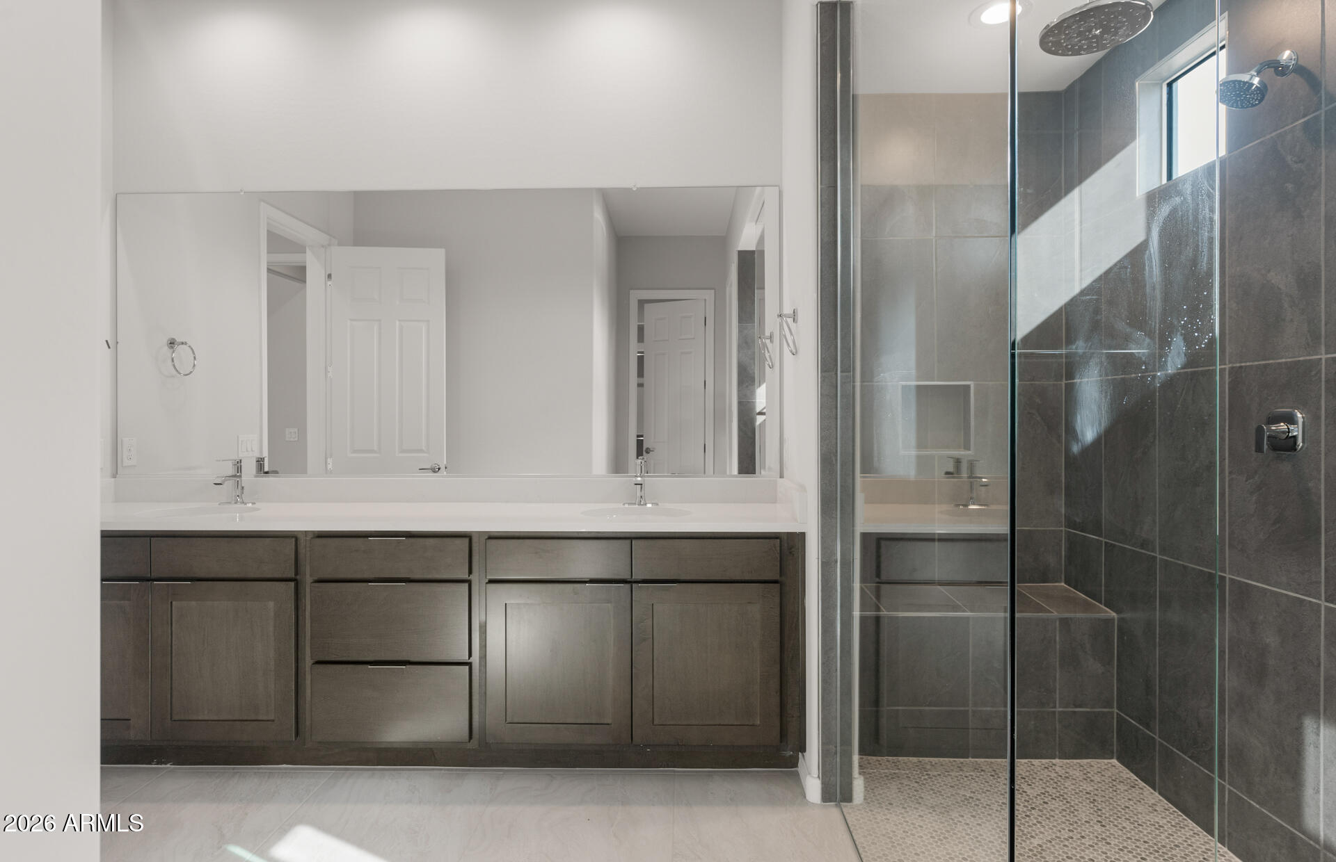 16081 West Bajada Road Surprise, AZ 85387 - Photo 23 of 28 a bathroom with a sink and mirror