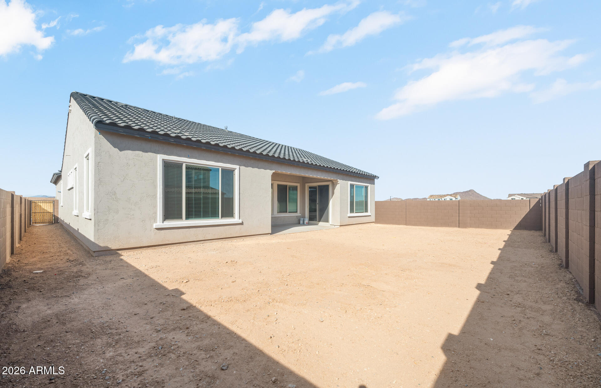 16081 West Bajada Road Surprise, AZ 85387 - Photo 27 of 28 a front view of a house with a yard