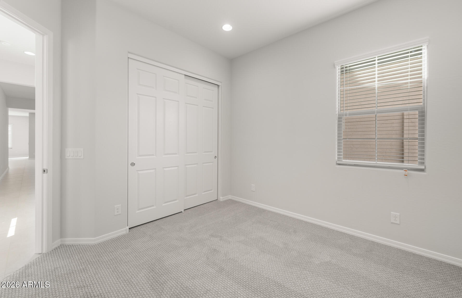 16081 West Bajada Road Surprise, AZ 85387 - Photo 2 of 28 an empty room with windows