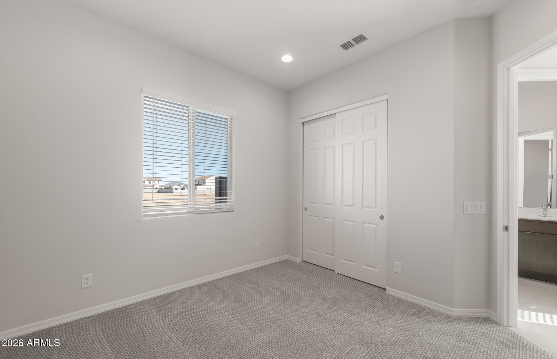 16081 West Bajada Road Surprise, AZ 85387 - Photo 3 of 28 an empty room with windows