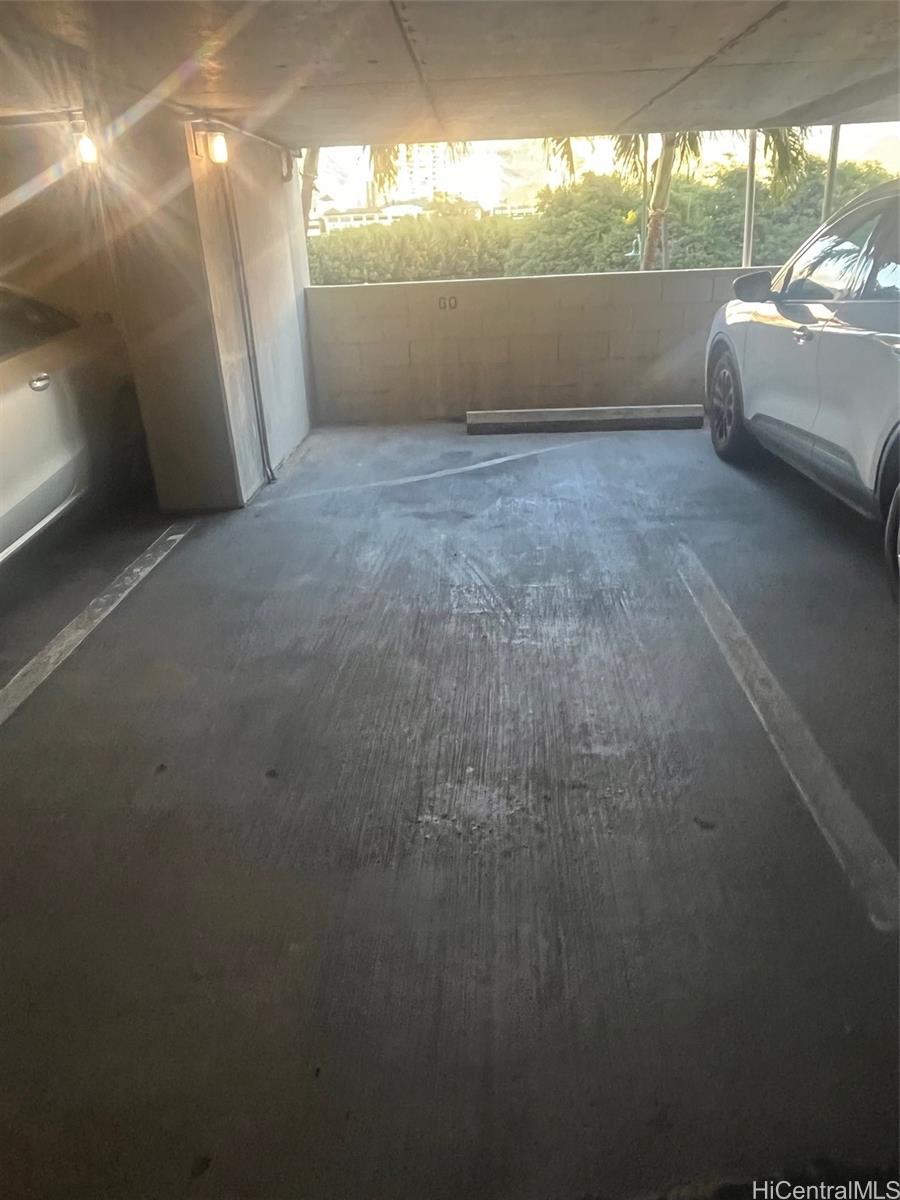 2211 Ala Wai Boulevard, Unit A60 Honolulu, HI 96815 - Photo 2 of 5 a view of room that has a car garage