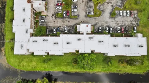 an aerial view of a house with a garden