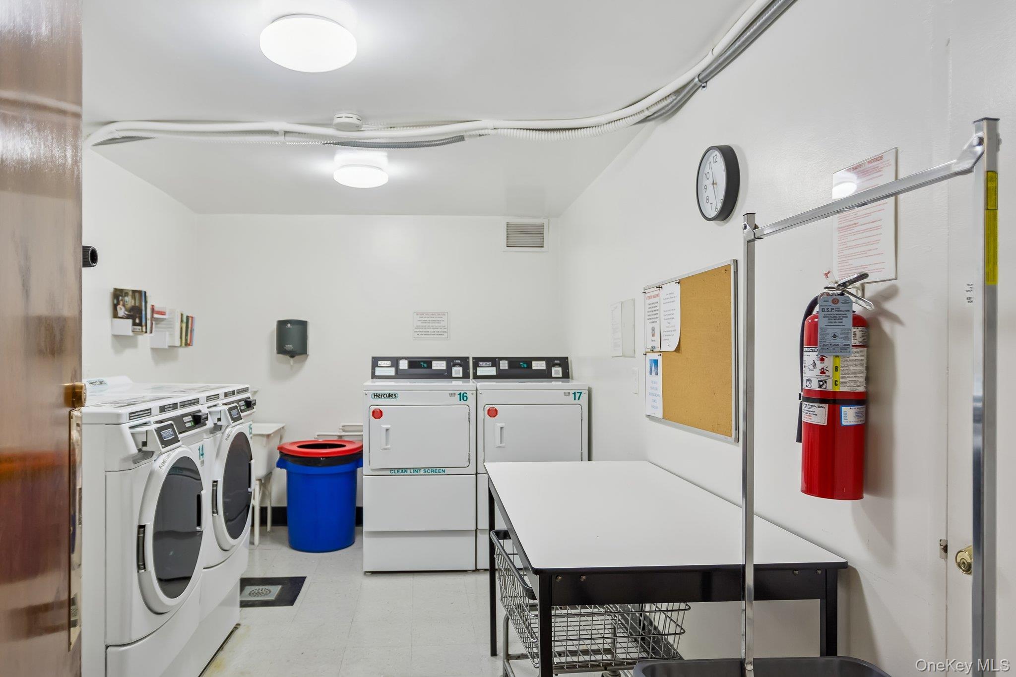 20 Old Mamaroneck Road, Unit 5Q White Plains, NY 10605 - Photo 14 of 18 a view of a storage and utility room with washer and dryer