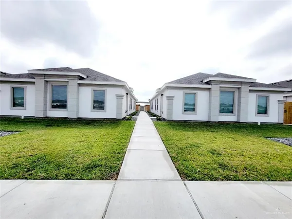 a view of a house with a garden