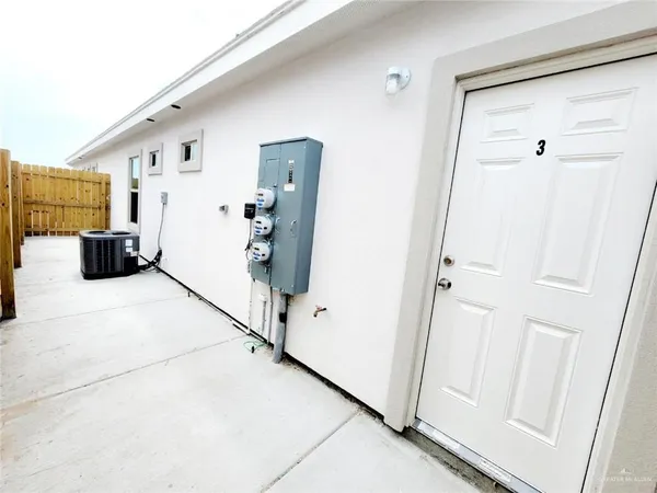 a view of livingroom with furniture and workspace