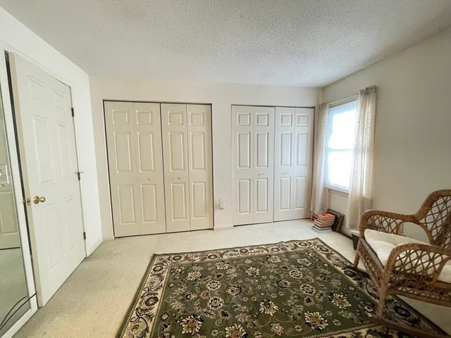 a bathroom with a sink a toilet and shower curtain