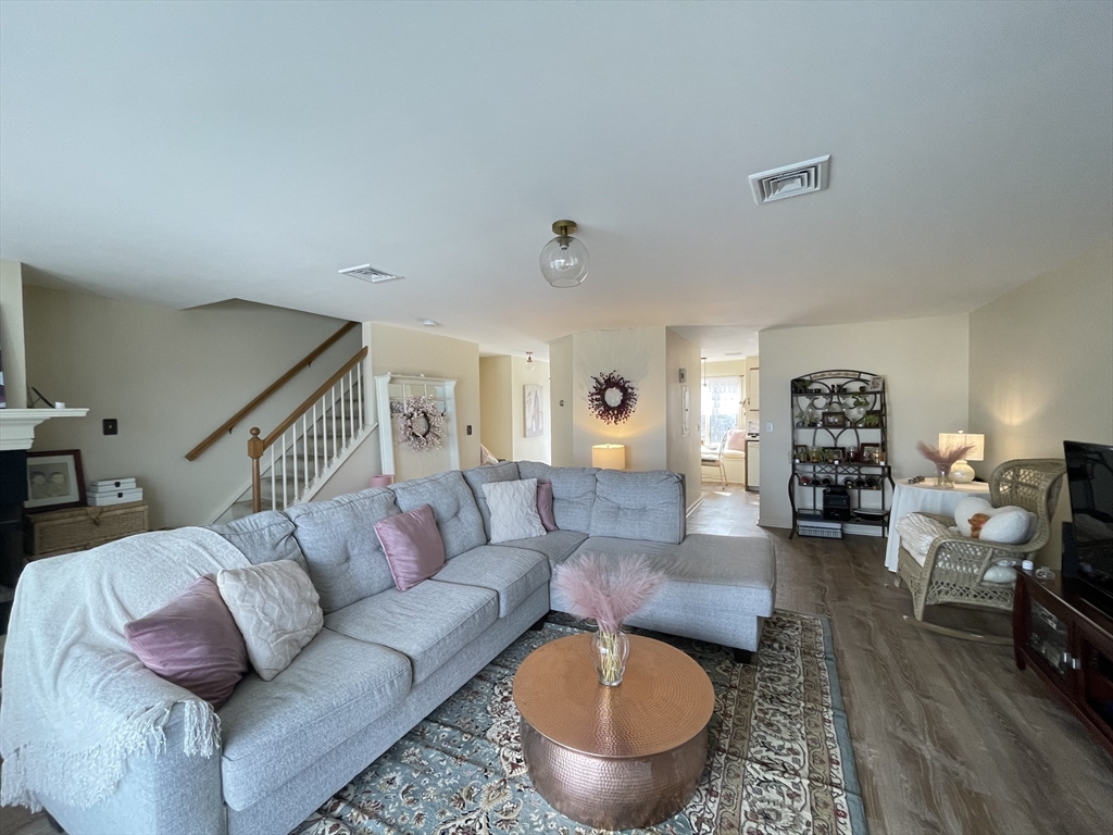 700 Shore Drive, Unit 6604 Fall River, MA 02721 - Photo 7 of 32 a living room with furniture and a wooden floor