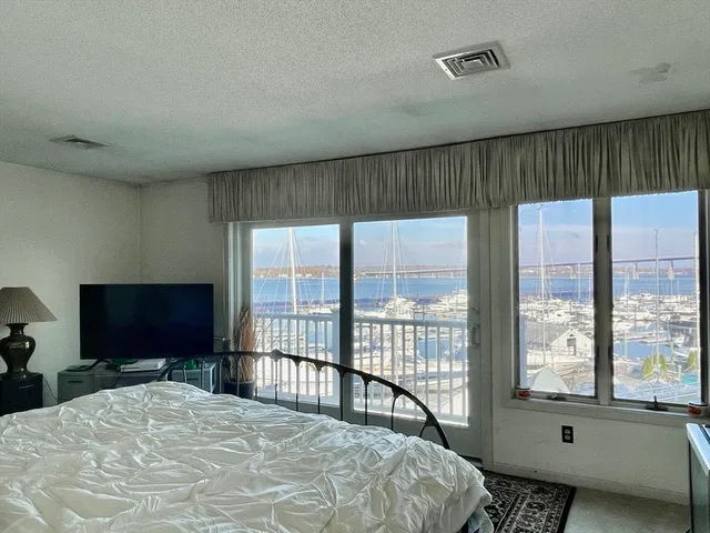 a bedroom with furniture and a couch