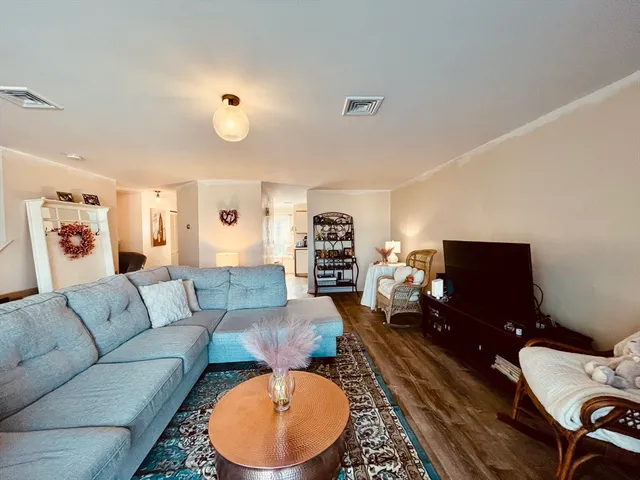 a bedroom with a bed and a fireplace