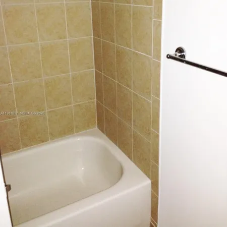 a view of a window in an empty room