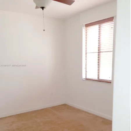 a view of a bathtub in a bathroom