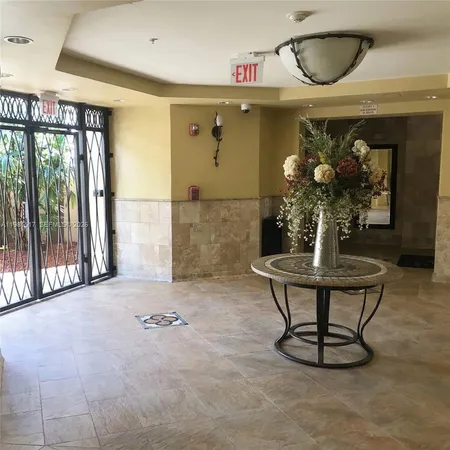 a view of entryway with a front door