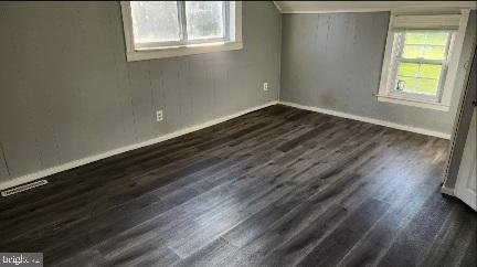 20 Church Landing Road Pennsville, NJ 08070 - Photo 13 of 22 an empty room with wooden floor and windows