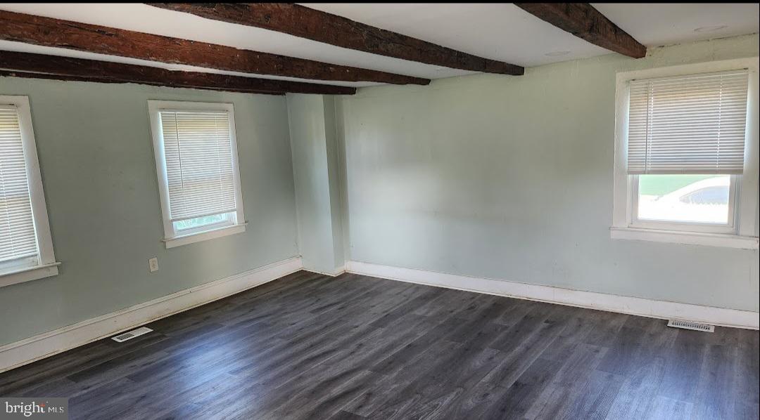 20 Church Landing Road Pennsville, NJ 08070 - Photo 10 of 22 a view of an empty room with wooden floor and a window