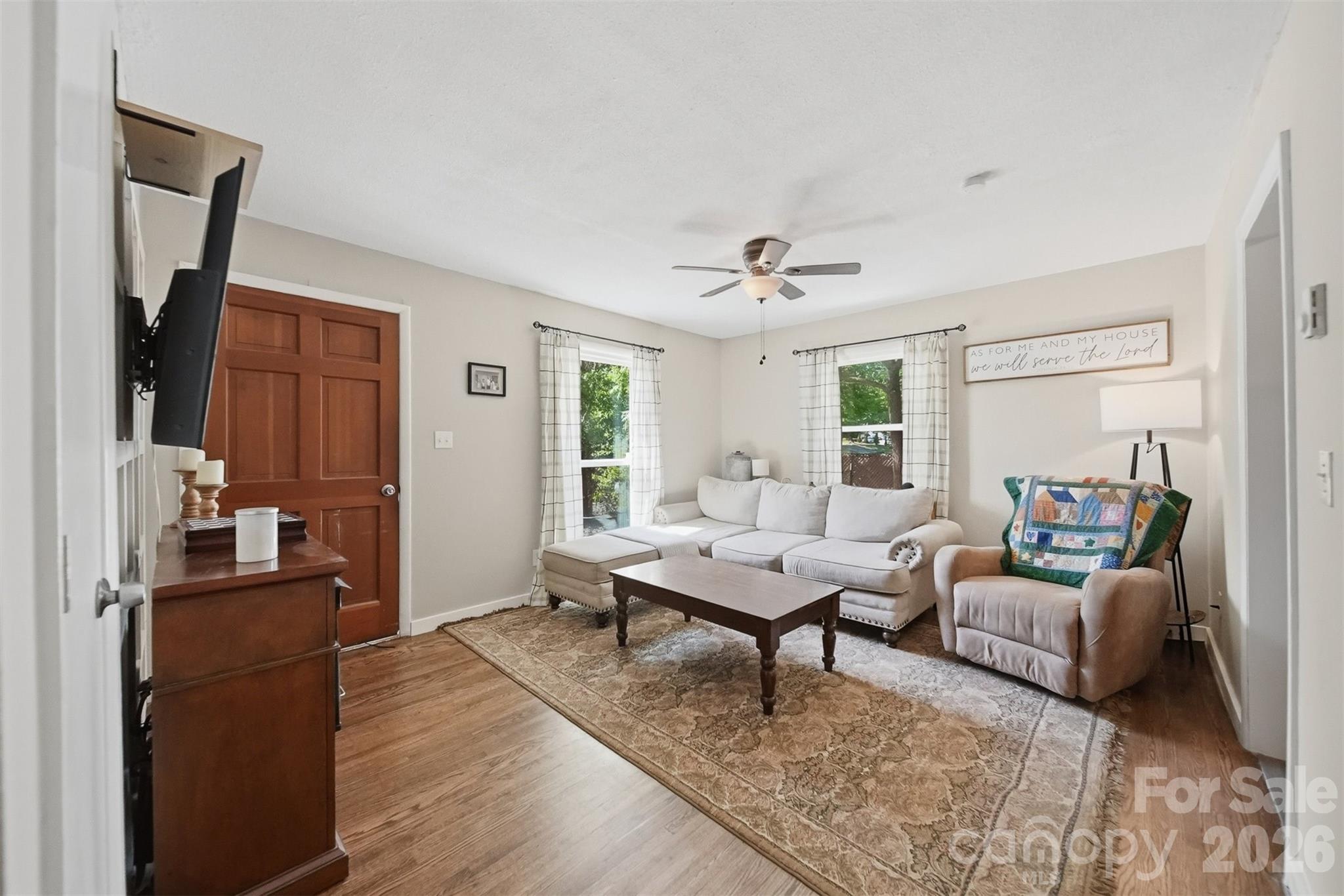 1312 County Home Road Conover, NC 28613 - Photo 3 of 25 a living room with furniture and wooden floor