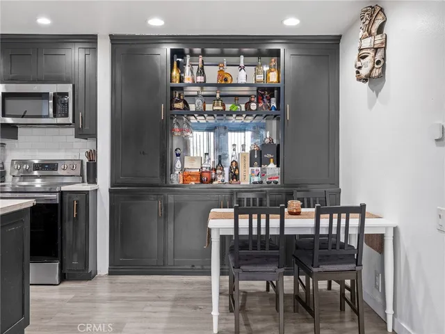 a view of a dining room with shelves
