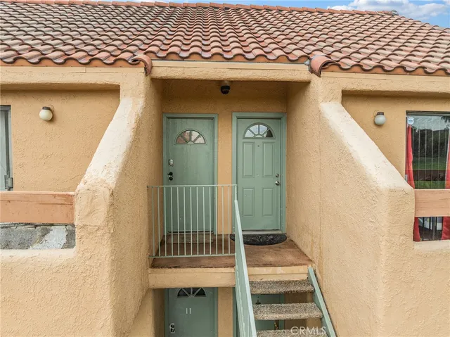 an aerial view of a house with a garden
