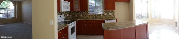 a view of hallway with a window