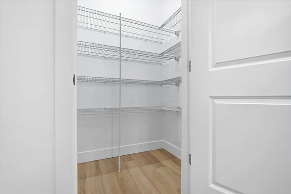 a view of an empty walk in closet