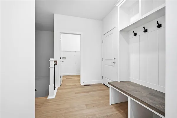 a view of a room with white walls