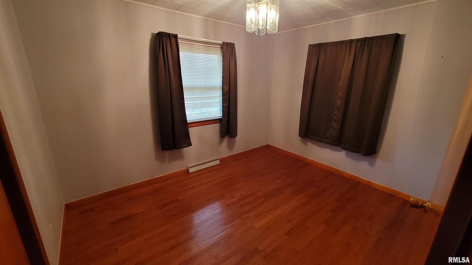 2234 Red Stripe Road Odin, IL 62870 - Photo 11 of 28 wooden floor in an empty room