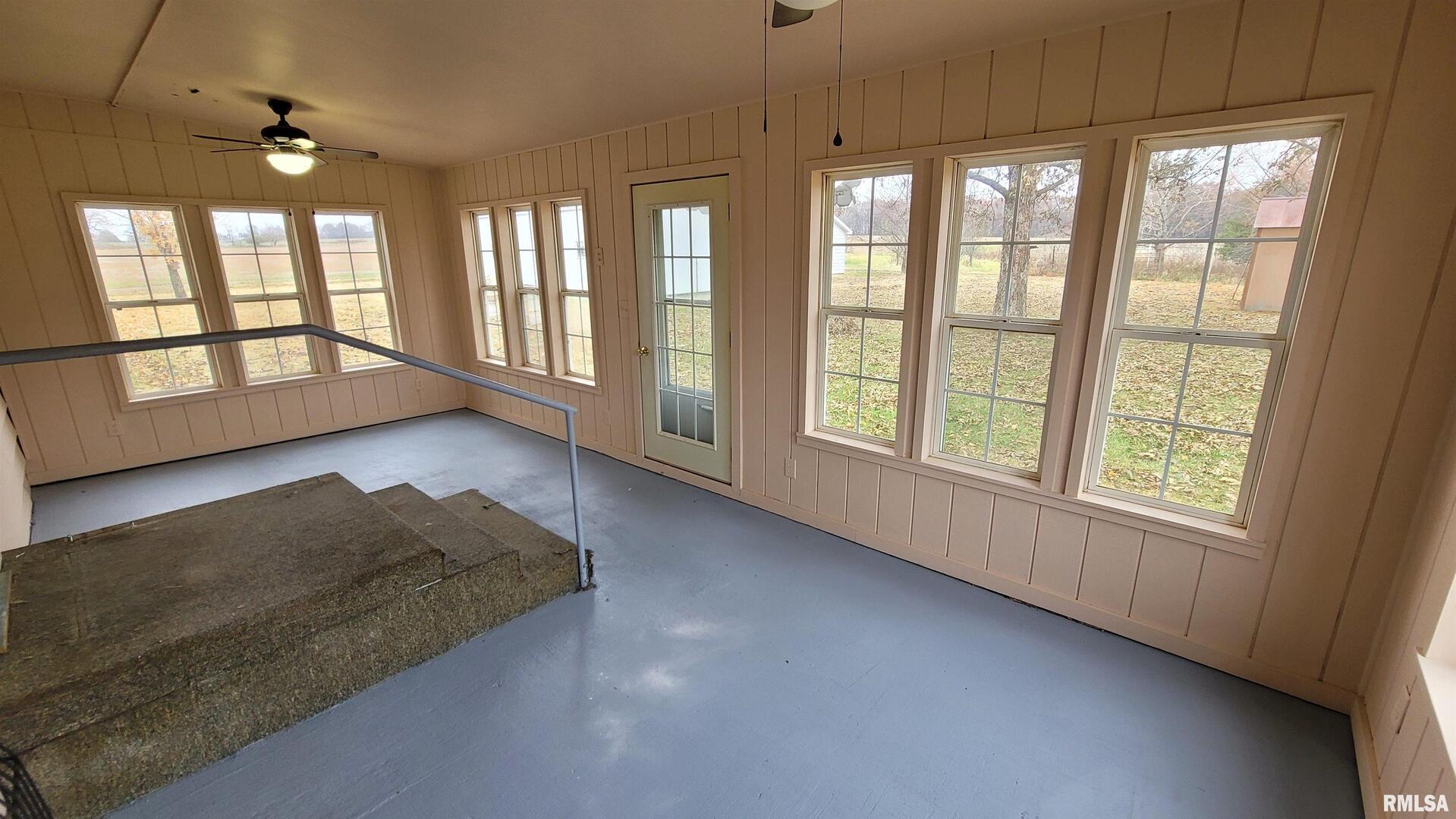 2234 Red Stripe Road Odin, IL 62870 - Photo 18 of 28 wooden floor in an empty room with a window