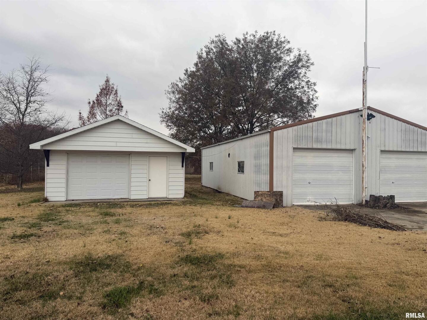 2234 Red Stripe Road Odin, IL 62870 - Photo 23 of 28 a view of a house with a yard and garage