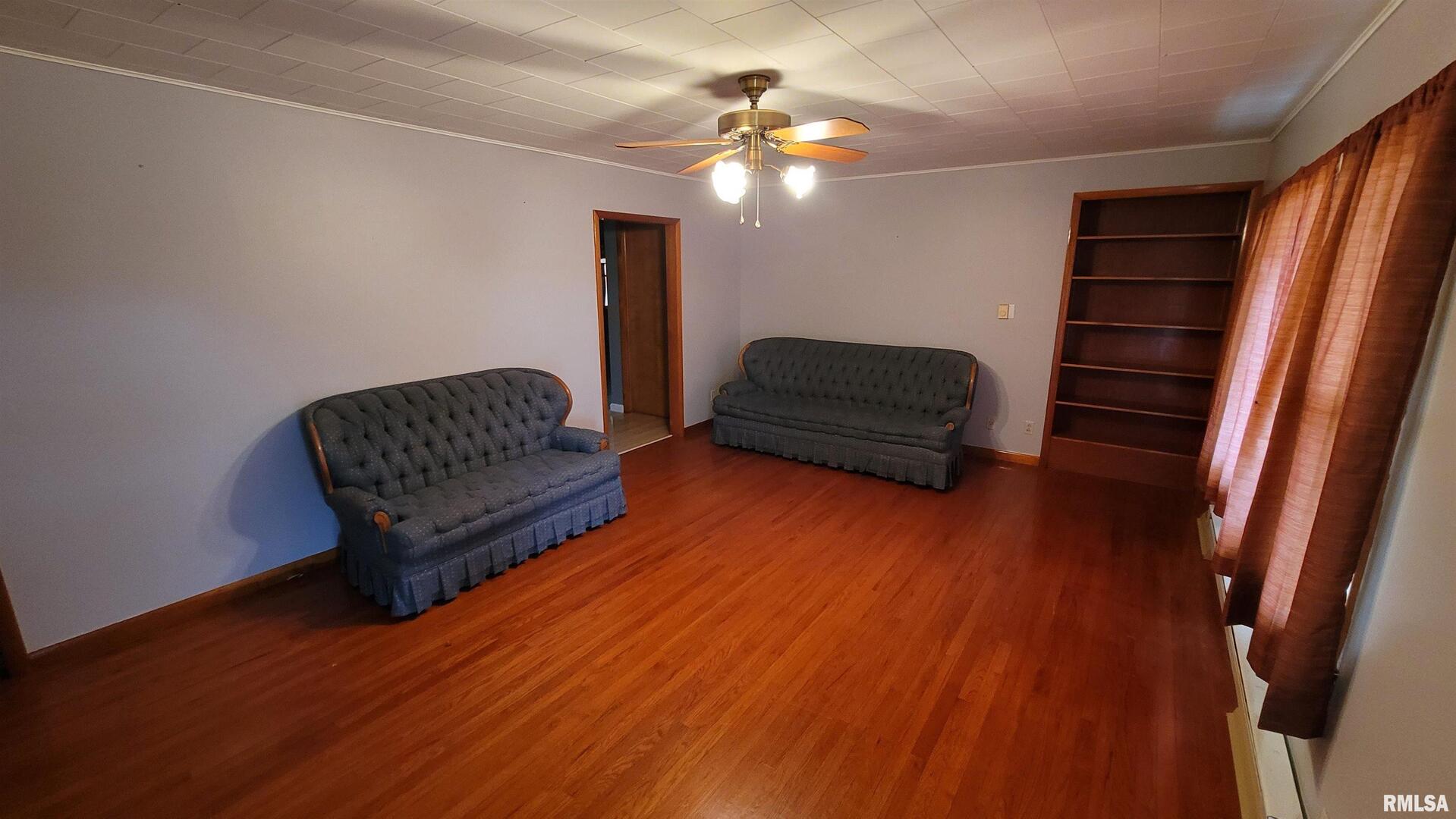 2234 Red Stripe Road Odin, IL 62870 - Photo 3 of 28 a living room with furniture and a wooden floor