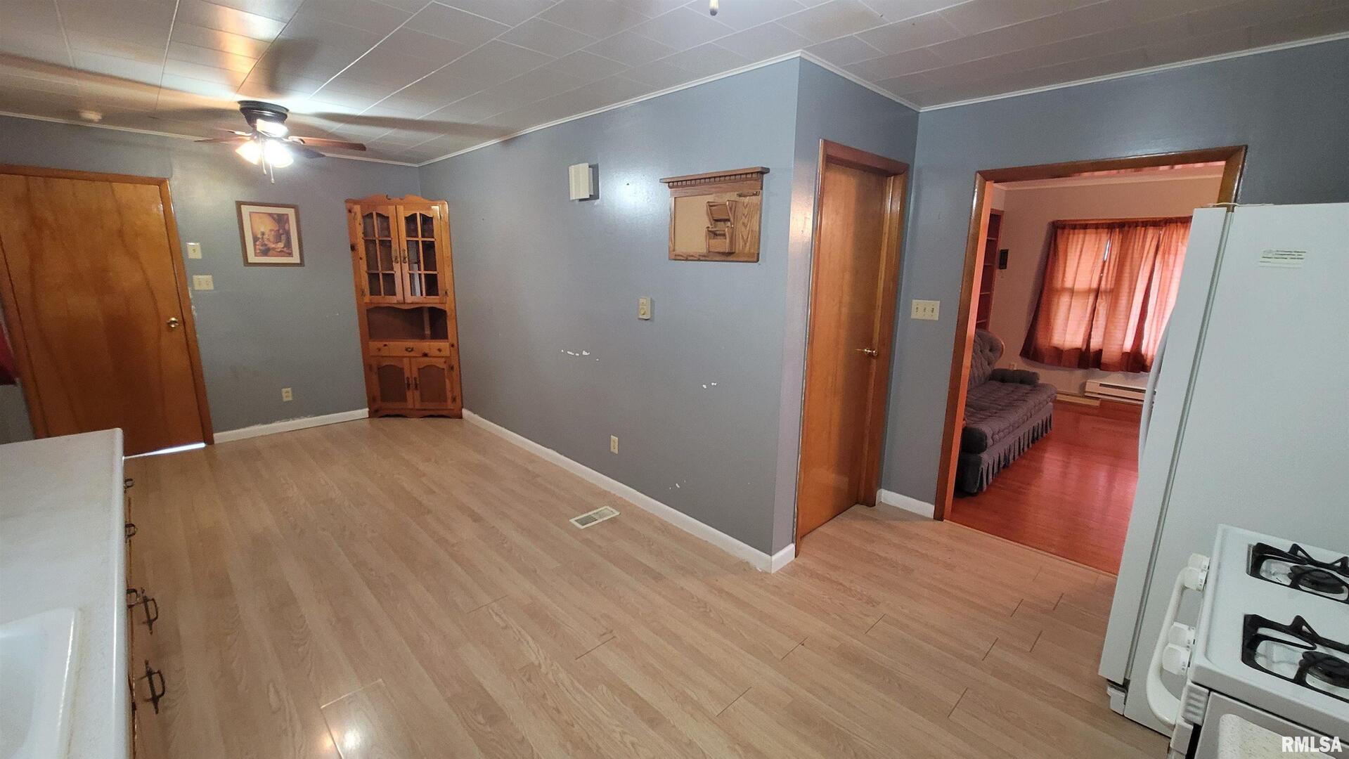 2234 Red Stripe Road Odin, IL 62870 - Photo 8 of 28 wooden floor in an empty room with a window